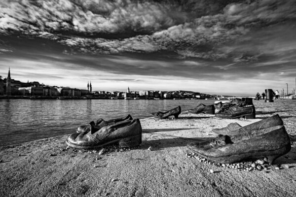 Shoes on the Danube Bank memorial in Budapest, Hungary, with iron shoes along the riverfront