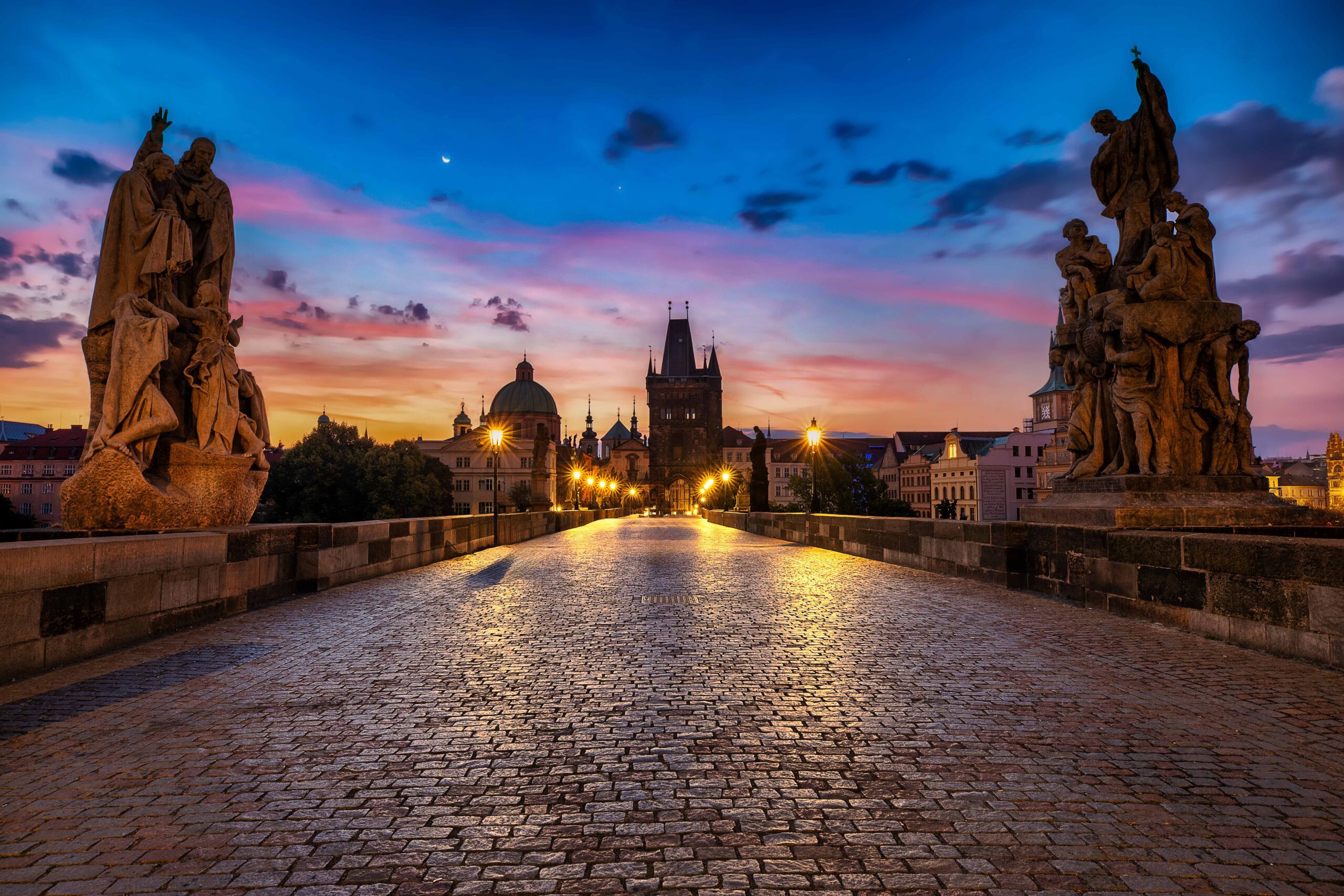 Charles Bridge in Prague, Czech Republic, with historic statues and view of the Vltava River