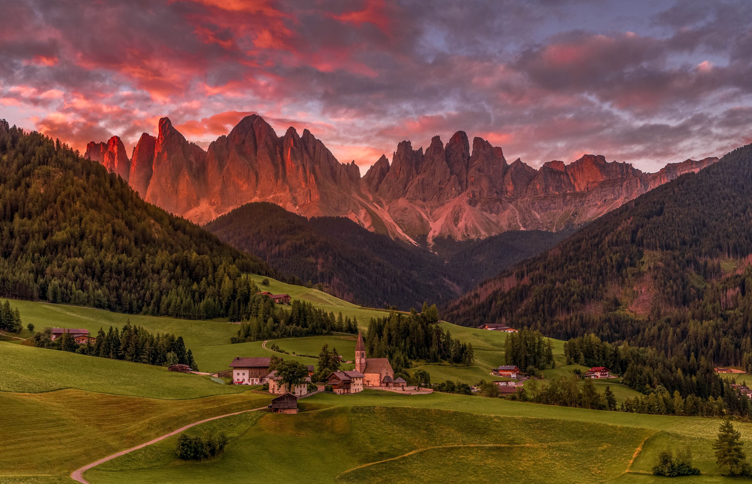 Santa Maddalena Church in Val di Funes, Dolomites, Italy, with the Odle/Geisler mountain peaks in the background