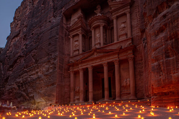 Petra Treasury in Jordan illuminated by hundreds of candles during a night event