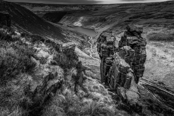 The Trinnacle rock formation in the Peak District, England, with panoramic views over Dovestone Reservoir